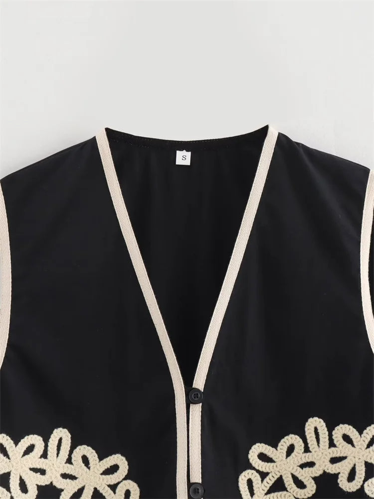 Kezia - Elegant damesvest met V-hals en bloemenapplicatie en borduursel