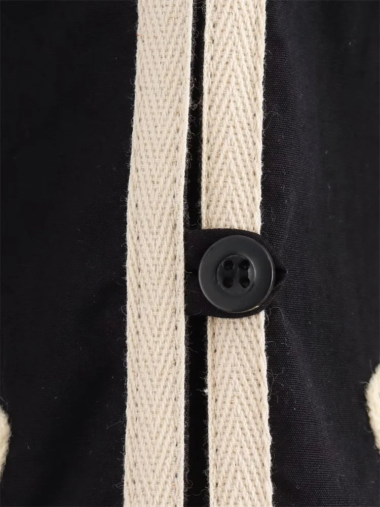 Kezia - Elegant damesvest met V-hals en bloemenapplicatie en borduursel
