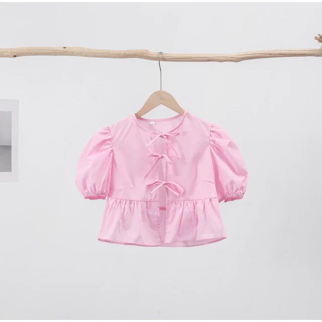 Kirsten - Damesblouse met pof mouwen en strikjes in verschillende prints