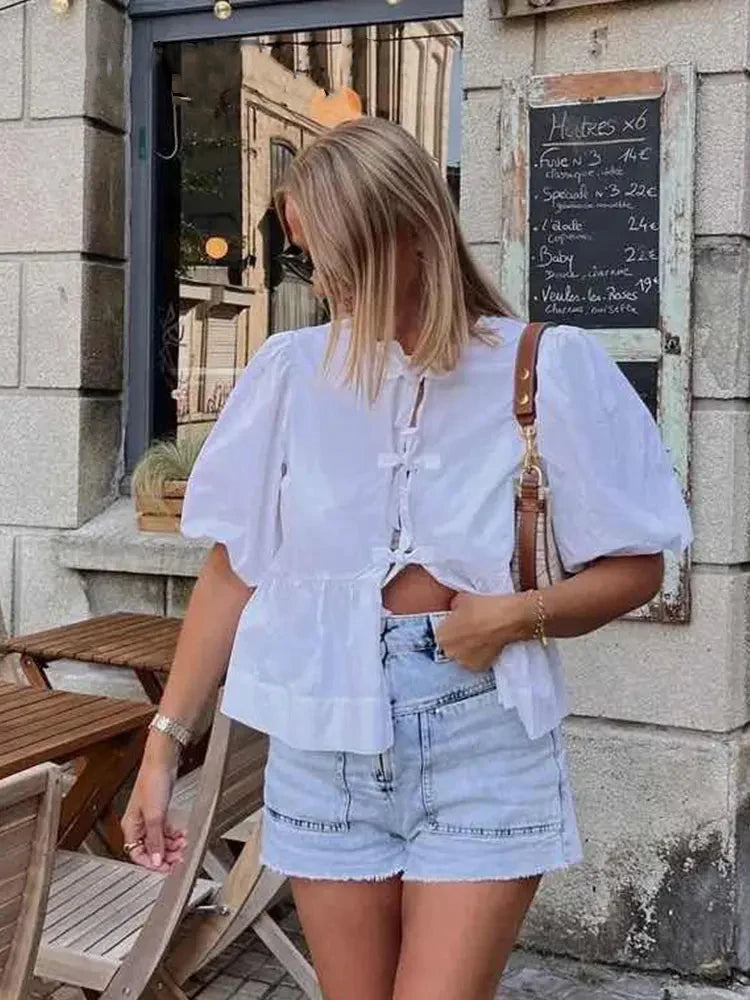 Kirsten - Damesblouse met pof mouwen en strikjes in verschillende prints