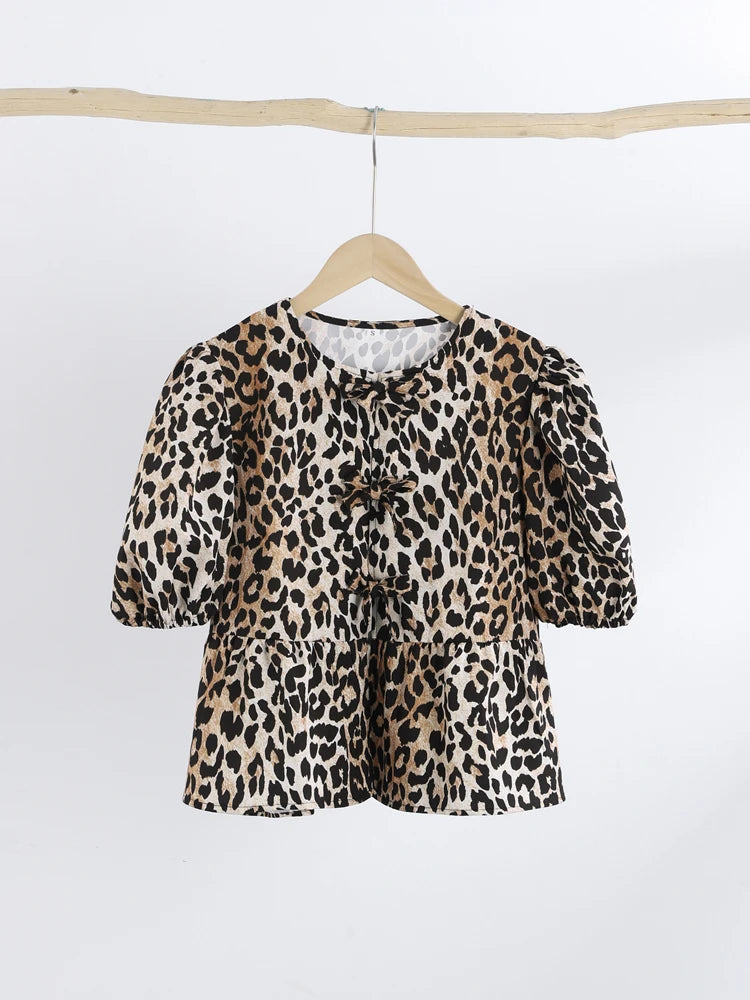 Kirsten - Damesblouse met pof mouwen en strikjes in verschillende prints