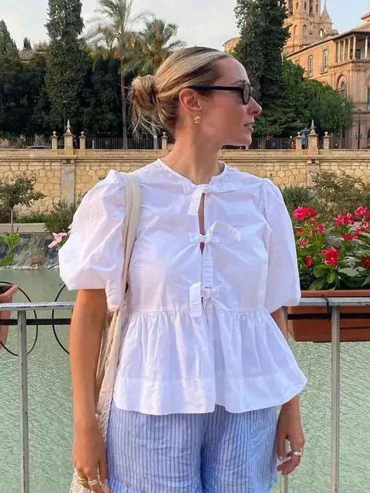 Kirsten - Damesblouse met pof mouwen en strikjes in verschillende prints