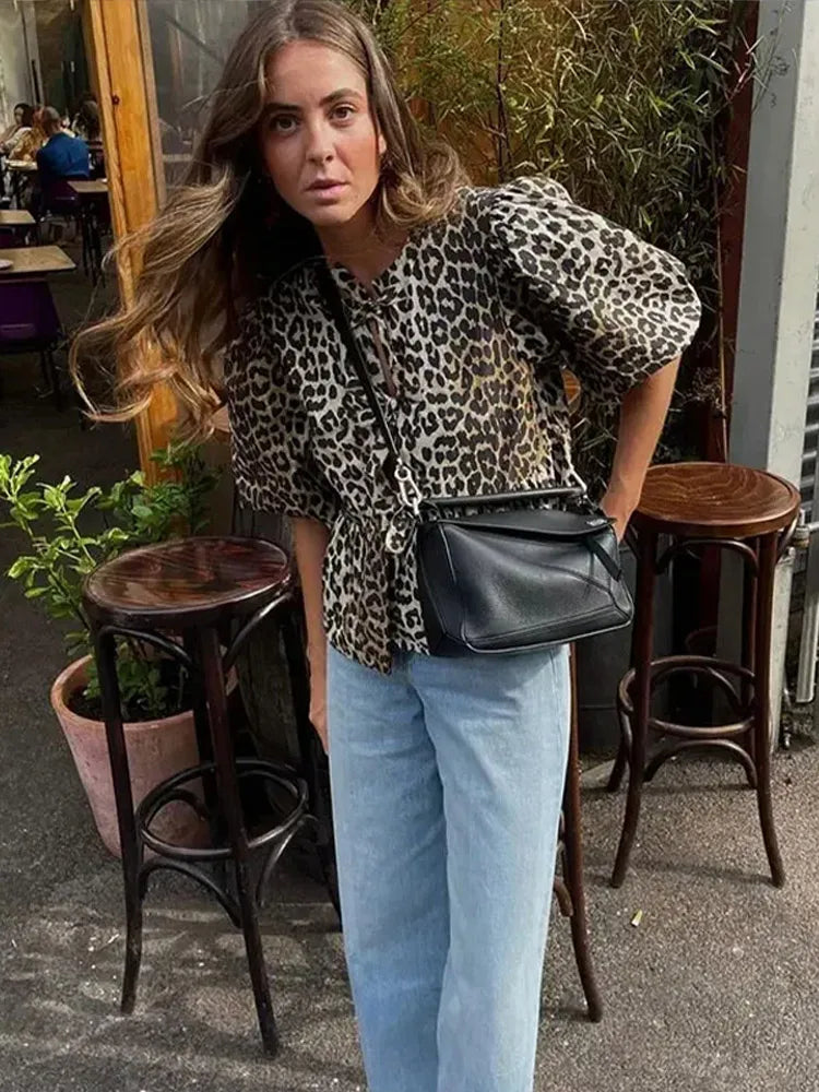 Kirsten - Damesblouse met pof mouwen en strikjes in verschillende prints