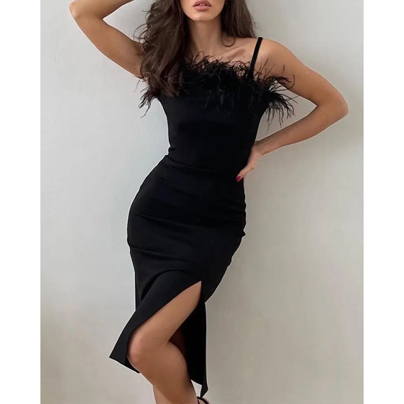 CLARA - Jurk met split en veren