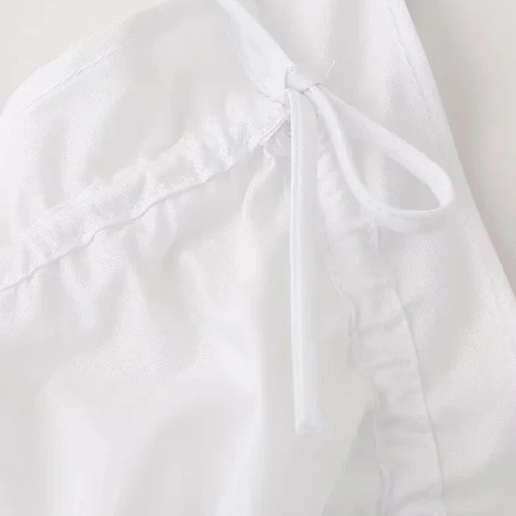 FERN - Rugloos Crop Top met Strik en Vetersluiting