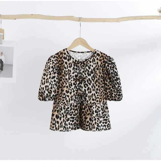 Kirsten - Damesblouse met pof mouwen en strikjes in verschillende prints