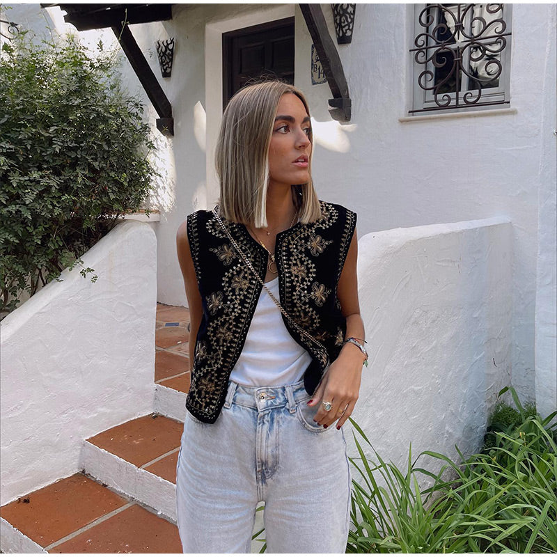 MILA - Vest met borduursel van zilveren lovertjes