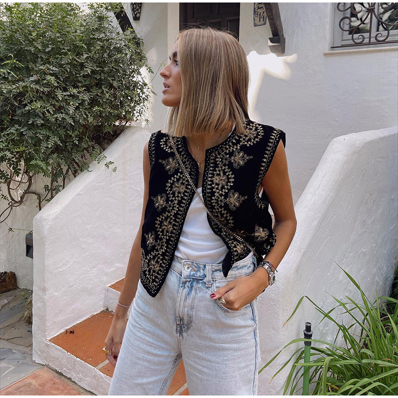 MILA - Vest met borduursel van zilveren lovertjes