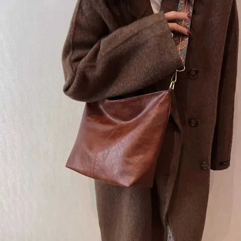 KRISTI - Effen vintage schoudertas voor dames