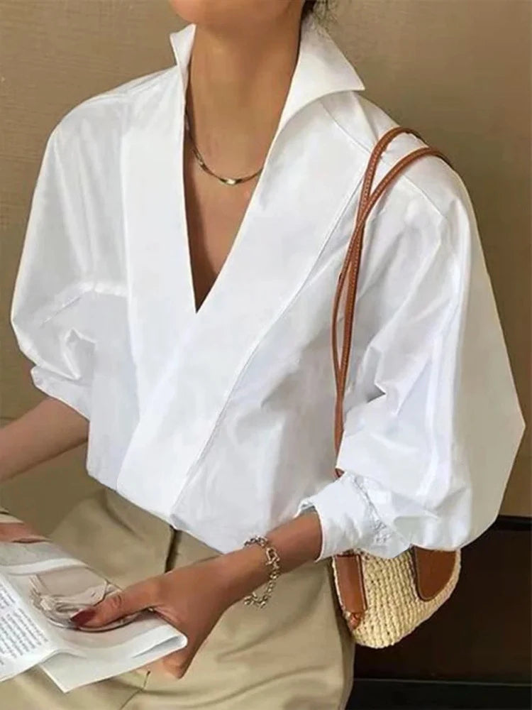 Tessel - Casual damesblouse met pofmouwen en V-hals